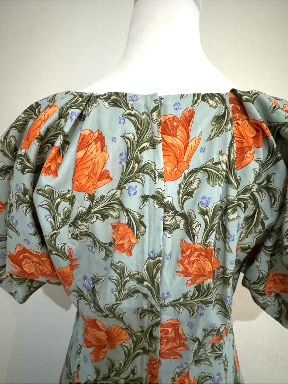 Agua Bendita Orange Floral Ruched Midi Dress on Light Blue - Picture 5 of 6